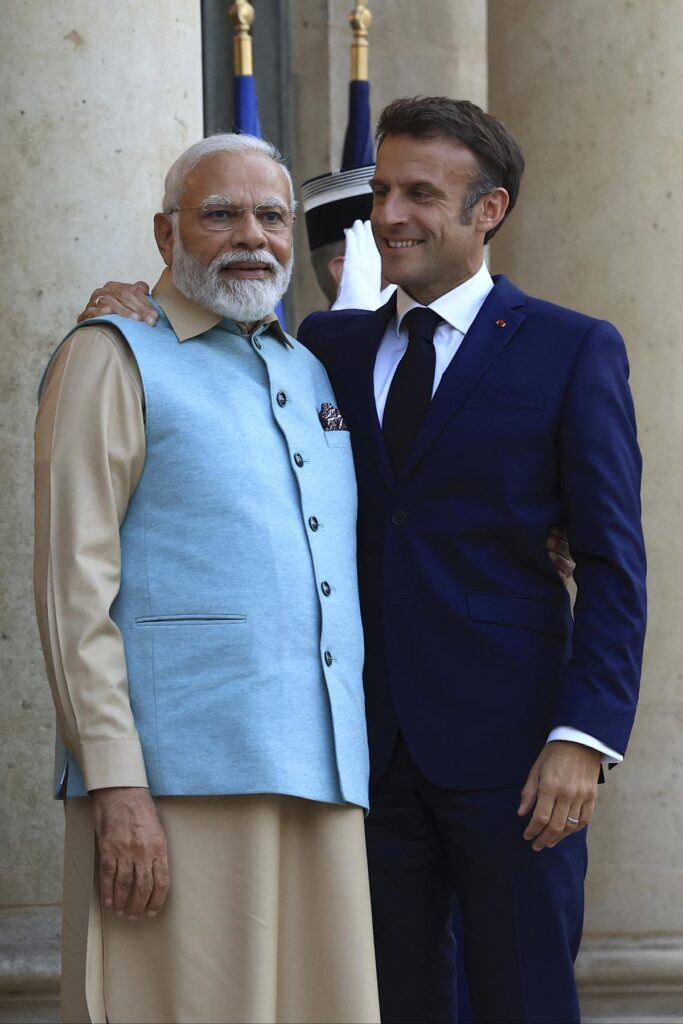 PM Modi with France PM Macron on UPI